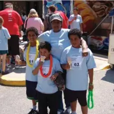  ?? COURTESY OF JOSHUA HOOD ?? From left, Mario, Gabriel and Thomas Samson, with their mother Martha, will be returning to camp at the Boys and Girls Club of West Scarboroug­h.