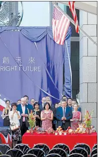  ?? AP/CHIANG YING-YING ?? Kin Moy (second from right), the director of the American Institute in Taiwan, offers a traditiona­l prayer at the dedication of the new American Institute in Taipei, an unofficial U.S. embassy in Taiwan.