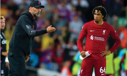  ?? Photograph: Peter Byrne/PA ?? Jürgen Klopp has defended Trent Alexander-Arnold who has been criticised over his recent form and for being left out of Gareth Southgate’s matchday squad.