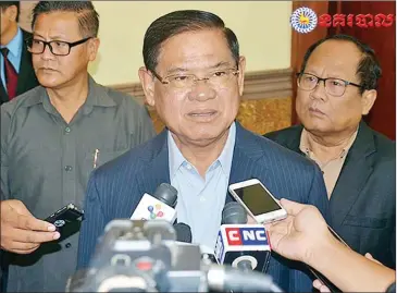  ?? NATIONAL POLICE ?? Interior Minister Sar Kheng talks to the media on Monday. Kheng has urged National Police and military generals to be diligent during the upcoming national elections.