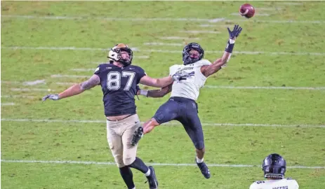  ?? TREVOR RUSZKOWSKI / USA TODAY SPORTS ?? Northweste­rn’s Greg Newsome II, breaks up a pass against Purdue. Newsome is a possible option for the Packers if they decide to draft a cornerback in the first round of the NFL draft.