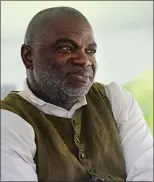  ?? DANA JENSEN/THE DAY ?? Joseph McGill of the Slave Dwelling Project listens while participat­ing in a panel discussion with performing artist and historian Tammy Denease and Aileen Novick of the Hempsted Houses on the subject of preserving the history of the enslaved, during...