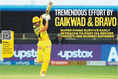  ?? Courtesy; BCCI ?? Top: Ruturaj Gaikwad of Chennai Super Kings smashes one to the fence during the Vivo Indian Premier League match against Mumbai Indians at the Dubai Internatio­nal Stadium yesterday.
Left: Chennai Super Kings players celebrates the wicket of Krunal Pandya of Mumbai Indians.