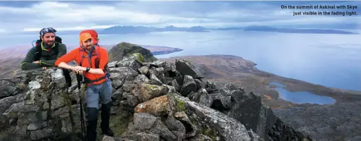  ??  ?? On the summit of Askival with Skye just visible in the fading light.