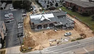  ?? CHUCK HAMLIN / STAFF ?? Constructi­on is 90 percent complete on the fourth and final new Kettering fire station, this one on West Dorothy Lane. Cost for the new stations and equipment is estimated at $30 million.