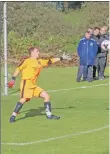  ?? Photo: Fiona McGinty ?? Left: Daniel Croarkin slots the ball home for Saints’ second goal.