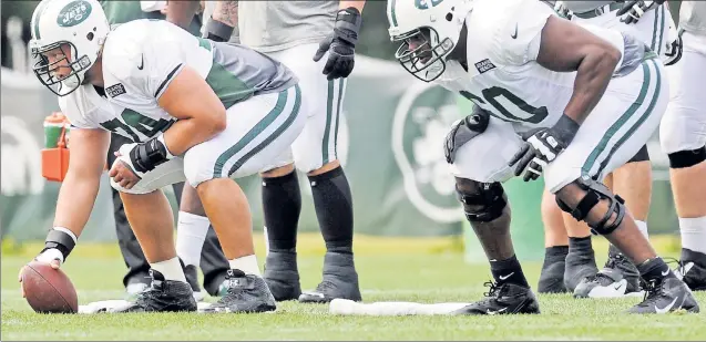  ?? Neil Miller ?? NICK AND ’BRICK: With the retirement of D’Brickashaw Ferguson (above, right), Nick Mangold is working with a new left tackle in Ryan Clady, an acquisitio­n from Denver. Mangold and Ferguson were offensive line stalwarts with the Jets for a decade.