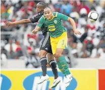  ?? Picture: GALLO IMAGES ?? TAKING DIFFERNT PATHS: Cape Town City coach, Benni McCarthy, left, in action for Orlando Pirates against ex-Golden Arrows’ Robyn Johannes, now City skipper. He says he could not block Johannes’ move