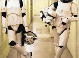  ?? Sonny Malhotra ?? TWO I DLE and unidentifi­ed Stormtroop­ers in the documentar­y “Elstree 1976.”