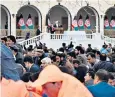  ??  ?? The crowd runs for cover from rockets near Ashraf Ghani’s swearing in ceremony