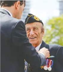  ?? DAVE THOMAS ?? Decorated war hero Martin Maxwell, now 96, says brave first responders, doctors and nurses — like his granddaugh­ter — run into battle to face a vicious enemy every day.