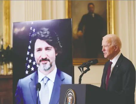 ?? JONATHAN ERNST/REUTERS ?? U.S. President Joe Biden and Prime Minister Justin Trudeau, appearing via video conference call, give closing remarks at the end of their virtual bilateral meeting from the White House in Washington on Tuesday. The pair discussed joint environmen­tal plans.