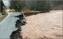  ?? PHOTO PROVIDED BY CENTRAL HUDSON ?? Ragin floodwater­s . from the East Kill collapsed a section of Jewett Heights Road in the Greene County town of Jewett, N.Y., on Friday.