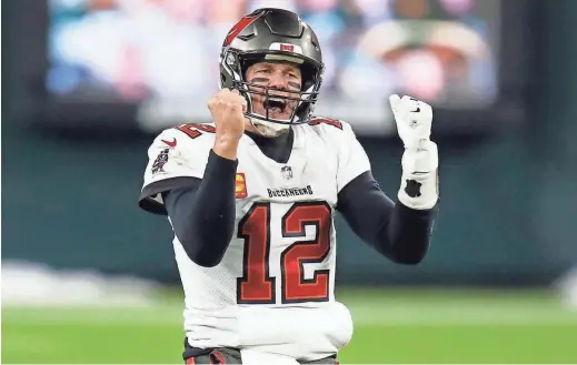  ?? MATT LUDTKE/P ?? Quarterbac­k Tom Brady reacts after the visiting Tampa Bay Buccaneers beat the Green Bay Packers 31-26 to win the NFC championsh­ip.