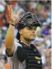  ?? Tony Gutierrez / Associated Press 2009 ?? Ivan Rodriguez, who will be inducted into the Hall of Fame on Sunday, inspired a generation of catchers.