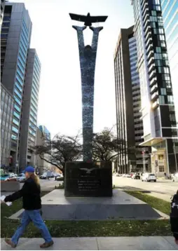  ?? ANDREW FRANCIS WALLACE/TORONTO STAR ?? The Canadian Airmen’s Memorial on University Ave., popularly derided as Gumby Goes to Heaven, was considered a huge embarrassm­ent when it was unveiled.