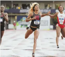  ?? PHOTO COuRTesy OF HaRVaRd aTHLeTICs ?? DASH OF SUCCESS: Harvard’s Gabby Thomas crosses the finish line at last week’s NCAA championsh­ips, where she placed second in the 200 meters.