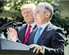  ?? Shawn Thew EPA ?? FORMER EPA chief Scott Pruitt with President Trump in 2017. The fact that Calabrese’s positions might become policy has some experts worried.