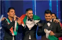  ?? AFP ?? Palestinia­n Arab Idol TV show winners Yaacoub Shahin, Ammar Mohammed and Amir Dandan perform on stage during the final in the pan-Arab song contest at MBC studios in Zouk Mosbeh, north of Beirut. —