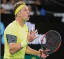  ?? VINCENT THIAN /AP ?? Tennys Sandgren reacts during his upset of No. 5 Dominic Thiem. He says part of his success has been reining in his emotions.