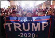  ?? MATT ROURKE – THE ASSOCIATED PRESS ?? Supporters cheer as Republican presidenti­al candidate former President Donald Trump speaks at a campaign event in Atkinson, N.H., on Tuesday.