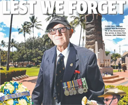  ?? CLOSE CALL: Vietnam veteran Alan Buckingham, 75, at the Remembranc­e Day service at Anzac Park. Pictures: ZAK SIMMONDS ??