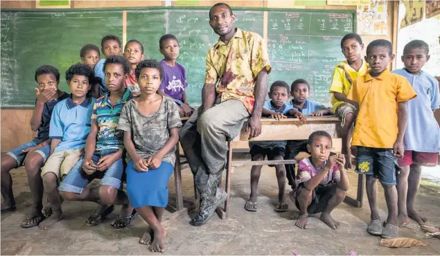  ?? Picture / Mike Scott ?? Louis Kumana, a teacher in Barai, is a passionate believer in the power of education to create opportunit­ies for children.