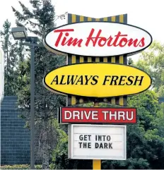  ?? THE CANADIAN PRESS FILES ?? Sales at Tim Hortons improved in the third quarter despite a feud between unhappy franchisee­s and parent company Restaurant Brands Internatio­nal. The company earned US$91.4 million in the quarter, up from US$86.3 million.
