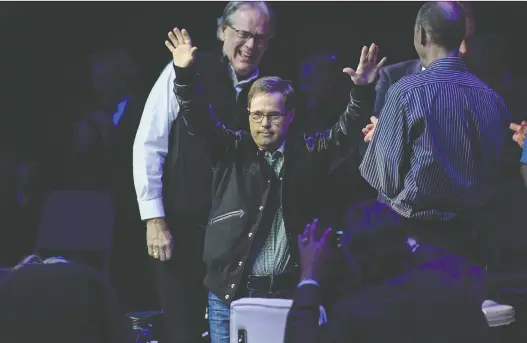  ?? DEREK LEUNG/GETTY IMAGES FILES ?? The much-loved Joey Moss, who died in 2020, is introduced here in 2014 during the Edmonton Oilers' Stanley Cup reunion at Rexall Place.