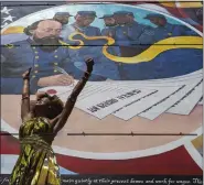  ?? ?? Dancer Prescylia Mae, of Houston, performs during a dedication ceremony for the mural ‘Absolute Equality’ in downtown Galveston, Texas, on June 19.