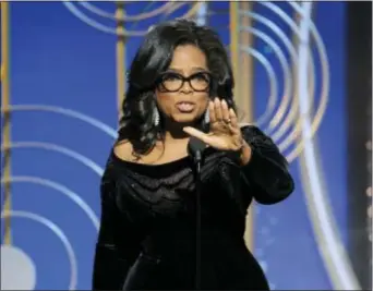  ?? PAUL DRINKWATER — NBC VIA AP ?? This image released by NBC shows Oprah Winfrey accepting the Cecil B. DeMille Award at the 75th Annual Golden Globe Awards in Beverly Hills on Sunday.