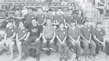  ??  ?? GOOD SHOW: The state swimmers, seen here with Anthony (front, third left) as well as SASA and team officials, bagged eight gold, 11 silver and eight bronze medals from the 2nd ASUM/NSC/MILO Mid & Long Distance Swiming Championsh­ip in Bukit Jalil...