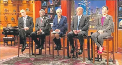  ?? RACHEL HINTON/SUN-TIMES ?? Mayoral candidates (from left) Paul Vallas, Willie Wilson, Toni Preckwinkl­e, Bill Daley and Susana Mendoza prepare for a debate at WTTW-Ch. 11 on Monday.