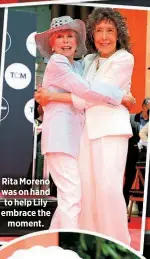  ?? ?? Rita Moreno was on hand to help Lily embrace the
moment.