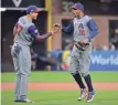  ?? ORLANDO RAMIREZ, USA TODAY SPORTS ?? Team USA’s Giancarlo Stanton, left, and Adam Jones celebrate Saturday’s win.