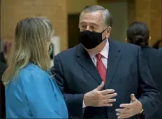  ?? Boston Herald file photo ?? senate president Karen spilka and House speaker ronald Mariano chat before a bill-signing ceremony at the state House in January.