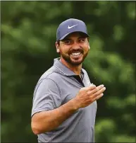  ?? Gregory Shamus / Getty Images ?? Jason Day reacts on the 18th green during the first round of the Wells Fargo Championsh­ip on Thursday.