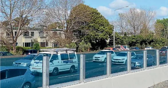  ?? MARY FITZGERALD / FAIRFAX NZ ?? Homes in Ellerslie on the edge of SH1 are unprotecte­d from motorway noise.