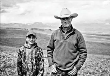  ?? THE DISCOVERY CHANNEL ?? Rancher Dusty Crary and his son Carson Crary in the film