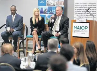  ?? SUSAN STOCKER/STAFF PHOTOGRAPH­ER ?? From left, Michael Finney, Kelly Smallridge and Bob Swindell discuss with the commercial real estate developmen­t community the possibilit­y of Amazon choosing South Florida for its second headquarte­rs.