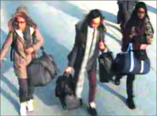  ??  ?? CCTV: Teenagers Amira Abase, Kadiza Sultana and Shamima Begum, pictured at Gatwick in February, may be among the fugitives