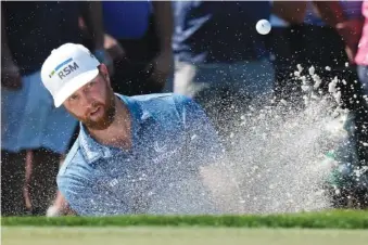  ?? AP PHOTO BY LYNNE SLADKY ?? Chris Kirk hits from a bunker and onto the third green at PGA National during the final round of the Honda Classic on Sunday in Palm Beach Gardens, Fla.