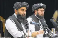  ?? EBRAHIM NOROOZI AP ?? Taliban government spokesman Zabiullah Mujahid speaks during a news conference in Kabul, Afghanista­n, on Thursday.