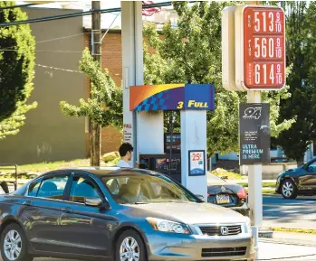  ?? APRIL GAMIZ/THE MORNING CALL ?? Signs show gas selling at $5.13 per gallon Monday at a Sunoco station in Hellertown.