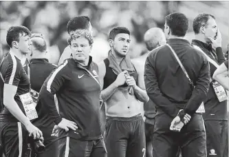  ?? ASSOCIATED PRESS FILE PHOTO ?? Australia's Massimo Luongo, centre, is “starving to play” this year in Russia’s World Cup after having to sit out in 2014. He would have been happy to get in and just play even a minute’s time.