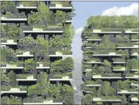  ?? Picture: Boeristudi­o/PA. ?? An artist’s impression of plant-covered high-rise city blocks as future “green” cities could resemble fairylands filled with radiant buildings and glowing trees, a report says.