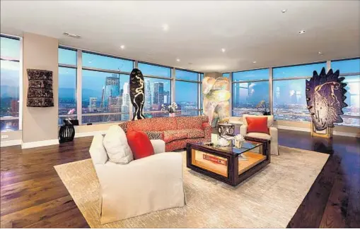  ?? Natalia Knezevic ?? MARY HART and Burt Sugarman are asking $8.8 million for a customized unit at the Ritz-Carlton Residences downtown.