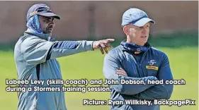  ??  ?? Labeeb Levy (skills coach) and John Dobson, head coach during a Stormers training session.
Picture: Ryan Willkisky, Backpagepi­x