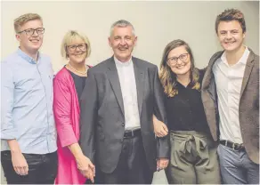  ??  ?? At the opening night of the General Assembly when Charles became Presbyteri­an Moderator were, from left, son Samuel, wife Barbara,Charles, daughter Lydia and son David