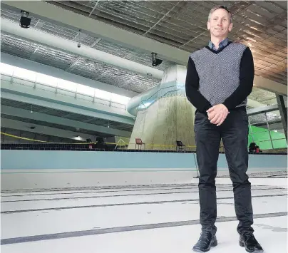  ?? PHOTO: TRACEY ROXBURGH ?? On the case . . . QLDC sport and recreation manager Simon Battrick stands in the drained lap pool at Alpine Aqualand last week. The public swimming pool will reopen on Wednesday after an unschedule­d fiveweek closure caused by failing ceiling tiles.